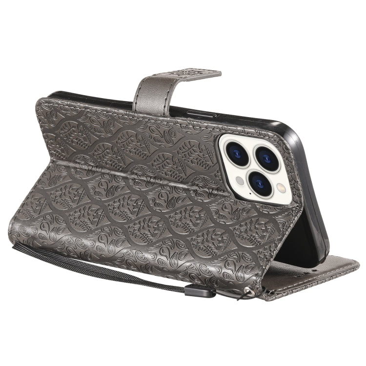 For iPhone 13 Pro Pressed Printing Rattan Flower Pattern Horizontal Flip PU Leather Case with Holder & Card Slots & Wallet & Photo Frame