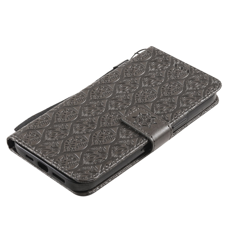 For iPhone 13 Pro Pressed Printing Rattan Flower Pattern Horizontal Flip PU Leather Case with Holder & Card Slots & Wallet & Photo Frame