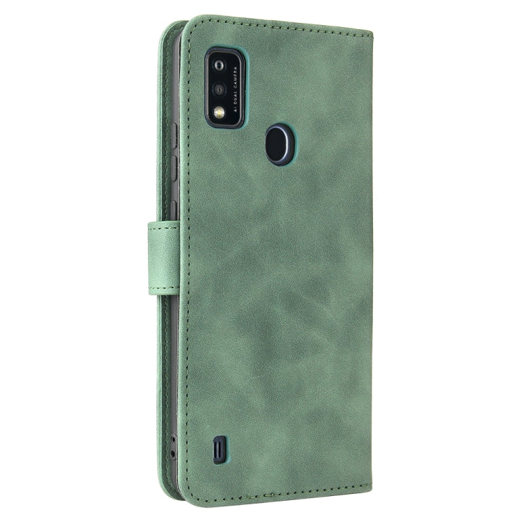 For ZTE Blade A51 Solid Color Skin Feel Magnetic Buckle Horizontal Flip Calf Texture PU Leather Case with Holder & Card Slots & Wallet