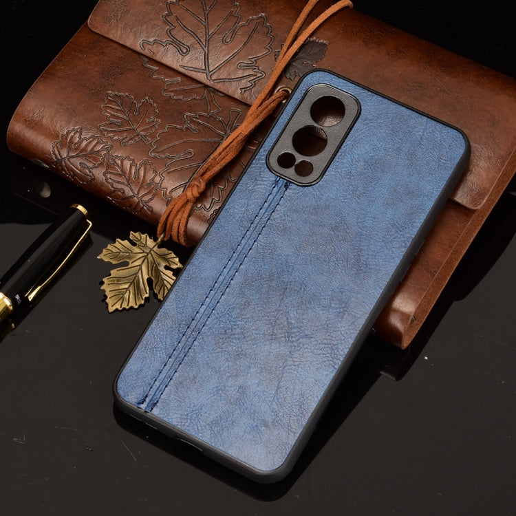 For OnePlus Nord 2 5G Shockproof Sewing Cow Pattern Skin PC + PU + TPU Case