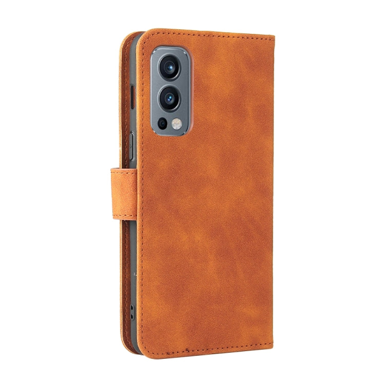 For OnePlus Nord 2 5G Solid Color Skin Feel Magnetic Buckle Horizontal Flip Calf Texture PU Leather Case with Holder & Card Slots & Wallet