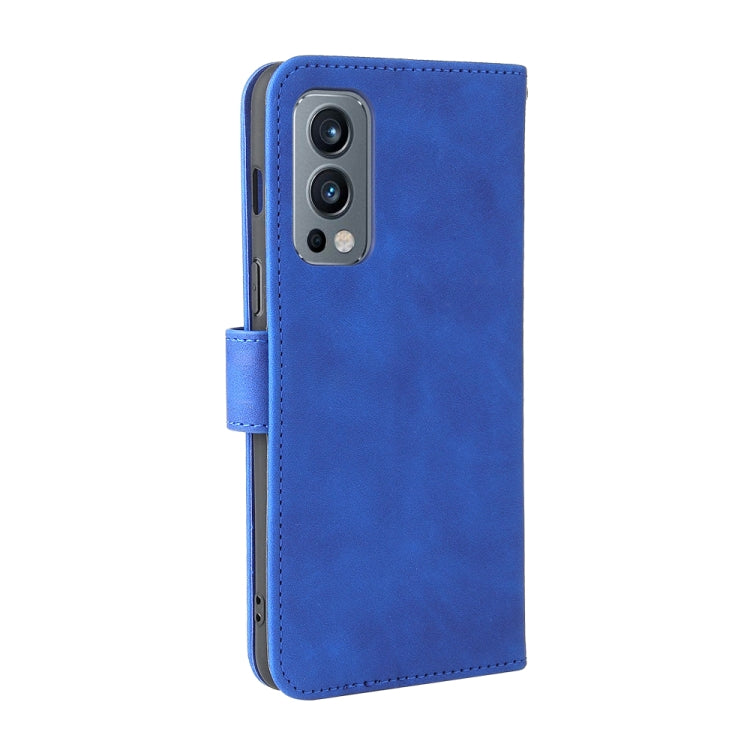 For OnePlus Nord 2 5G Solid Color Skin Feel Magnetic Buckle Horizontal Flip Calf Texture PU Leather Case with Holder & Card Slots & Wallet