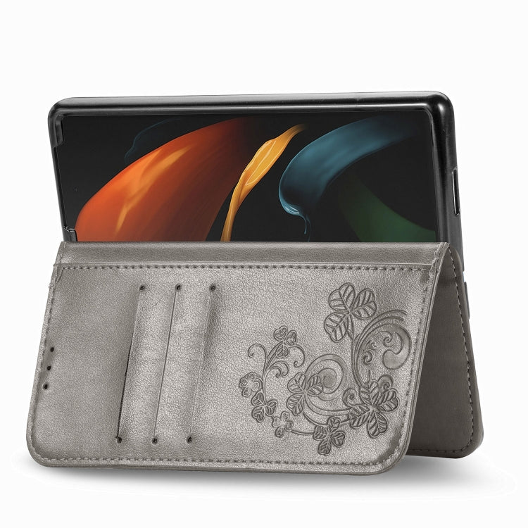 For Samsung Galaxy Z Fold3 5G Four-leaf Clasp Embossed Buckle Mobile Phone Protection Leather Case with Lanyard & Card Slot & Wallet & Bracket Function