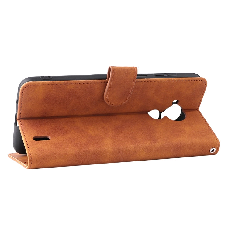 For Nokia C30 Solid Color Skin Feel Magnetic Buckle Horizontal Flip Calf Texture PU Leather Case with Holder & Card Slots & Wallet