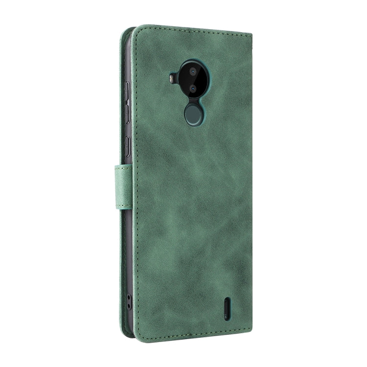 For Nokia C30 Solid Color Skin Feel Magnetic Buckle Horizontal Flip Calf Texture PU Leather Case with Holder & Card Slots & Wallet