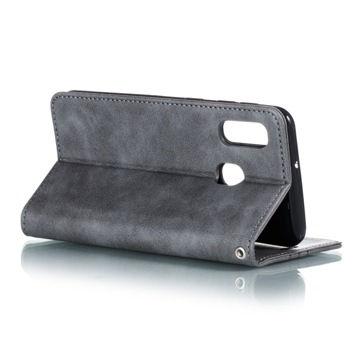 For Galaxy A20e Splicing Color Magnetic Hem Horizontal Flip Leather Case with Holder & Card Slots