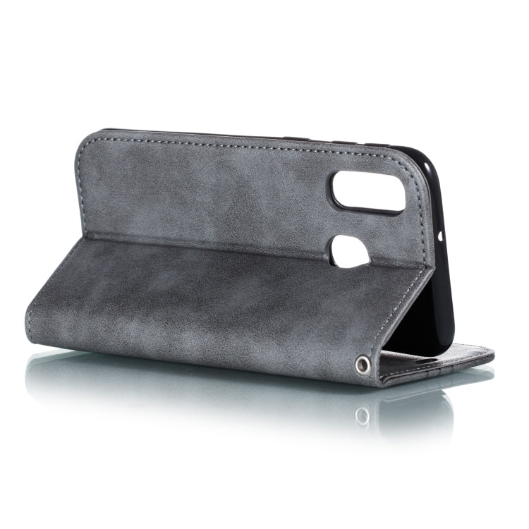 For Galaxy A40 Splicing Color Magnetic Hem Horizontal Flip Leather Case with Holder & Card Slots