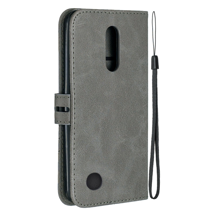 For LG K10 2017 Stitching Style 2-Color Cow Texture Horizontal Flip PU Leather Case with Holder & Card Slot & Lanyard