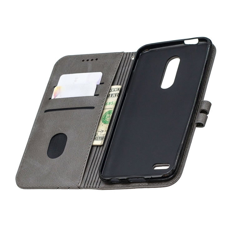 For LG K10 2018 Stitching Style 2-Color Cow Texture Horizontal Flip PU Leather Case with Holder & Card Slot & Lanyard