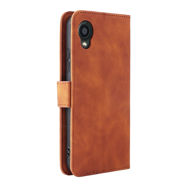 For Kyocera DIGNO BX2 Skin Feel Magnetic Buckle Leather Phone Case