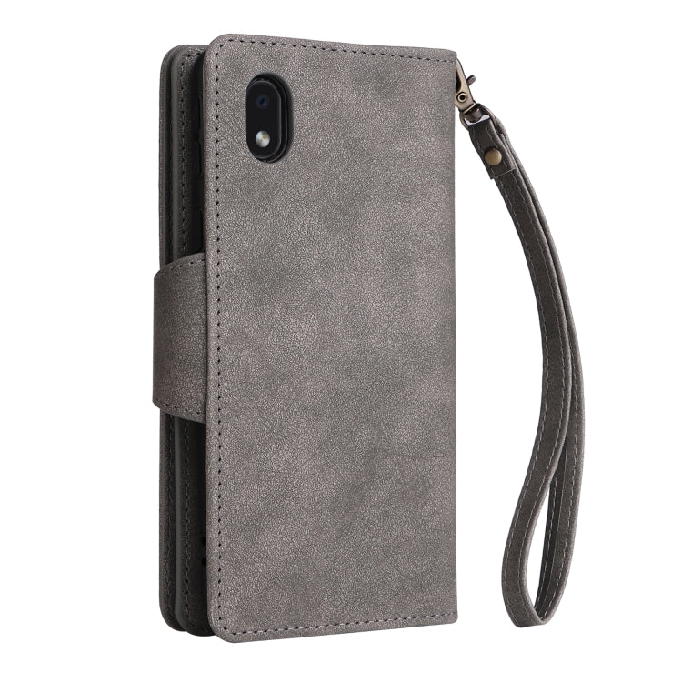 For Samsung Galaxy A01 Core Rivet Buckle 9 Cards Three Fold Leather Phone Case