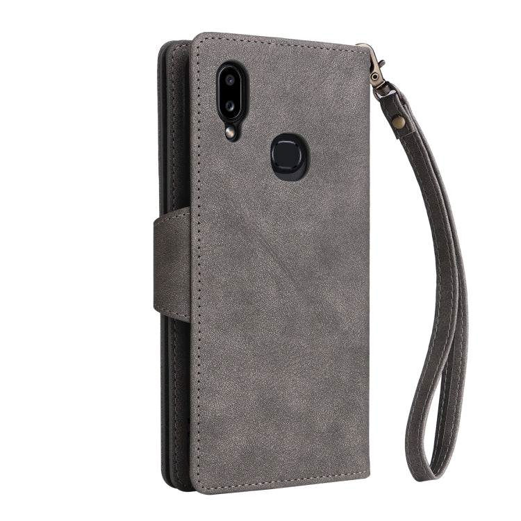 For Samsung Galaxy A10s Rivet Buckle 9 Cards Three Fold Leather Phone Case