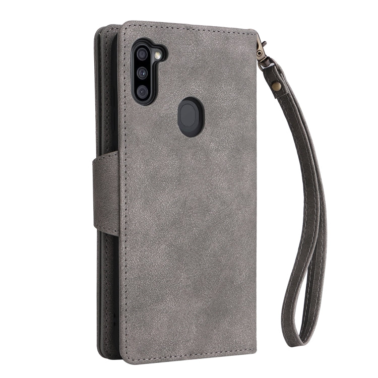 For Samsung Galaxy A11 EU Version Rivet Buckle 9 Cards Three Fold Leather Phone Case