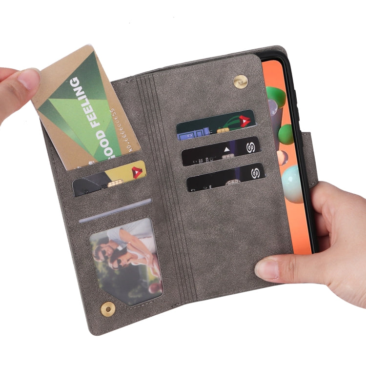 For Samsung Galaxy A11 EU Version Rivet Buckle 9 Cards Three Fold Leather Phone Case