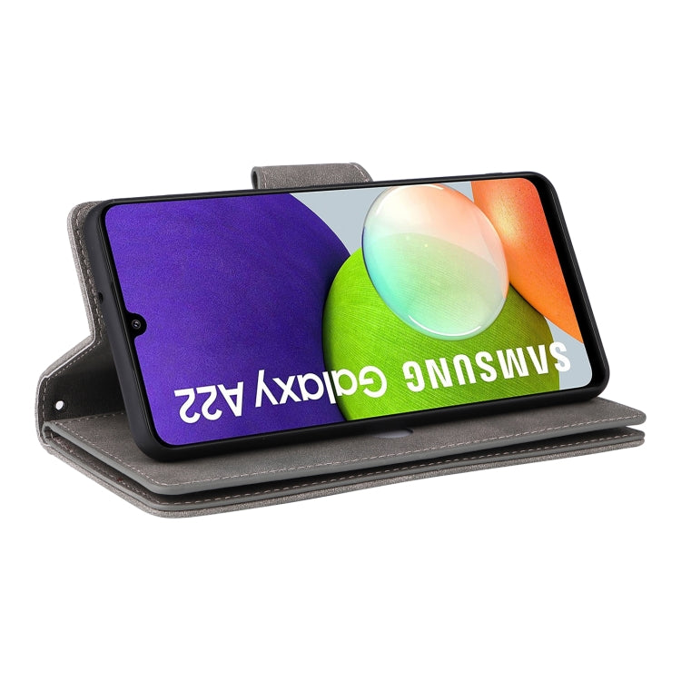 For Samsung Galaxy A22 4G Rivet Buckle 9 Cards Three Fold Leather Phone Case