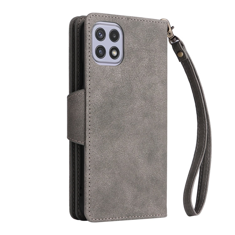 For Samsung Galaxy A22 5G Rivet Buckle 9 Cards Three Fold Leather Phone Case
