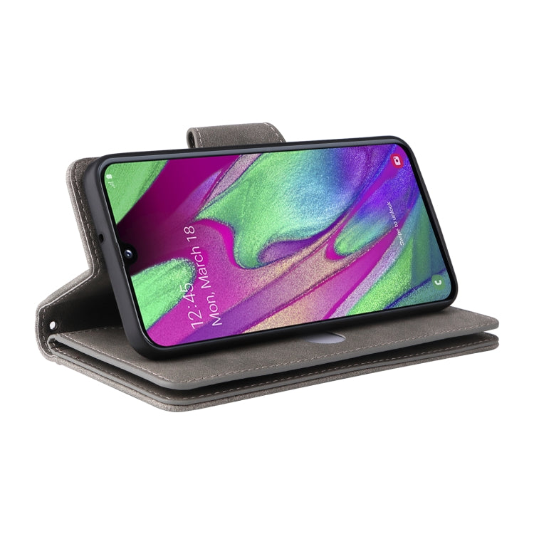For Samsung Galaxy A40 Rivet Buckle 9 Cards Three Fold Leather Phone Case