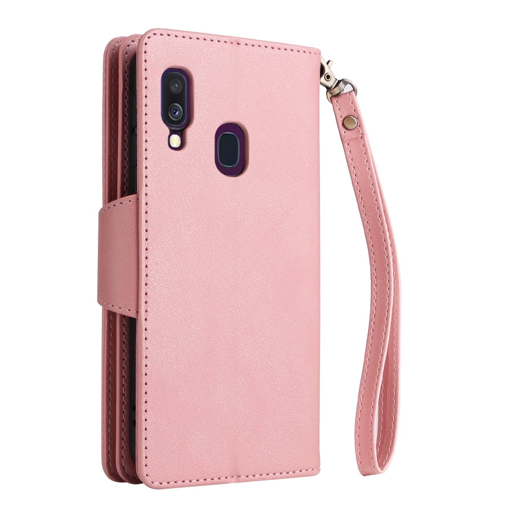 For Samsung Galaxy A40 Rivet Buckle 9 Cards Three Fold Leather Phone Case