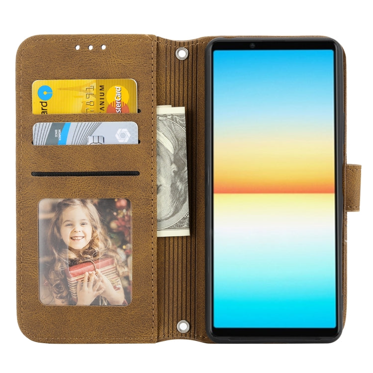 For Sony Xperia 10 IV Embossed Striped Magnetic Buckle Horizontal Flip Phone Leather Case