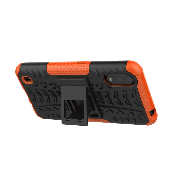 For Galaxy A01 Tire Texture Shockproof TPU+PC Protective Case with Holder