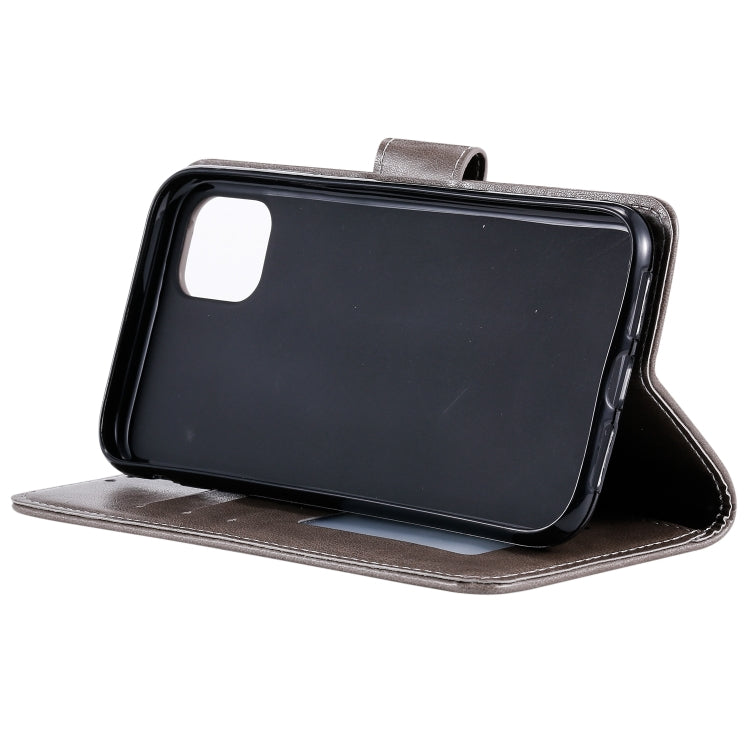 For iPhone 14 Pro Max Totem Flower Embossed Leather Case