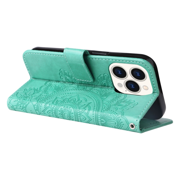 For iPhone 14 Pro 7-petal Flowers Embossing Leather Case