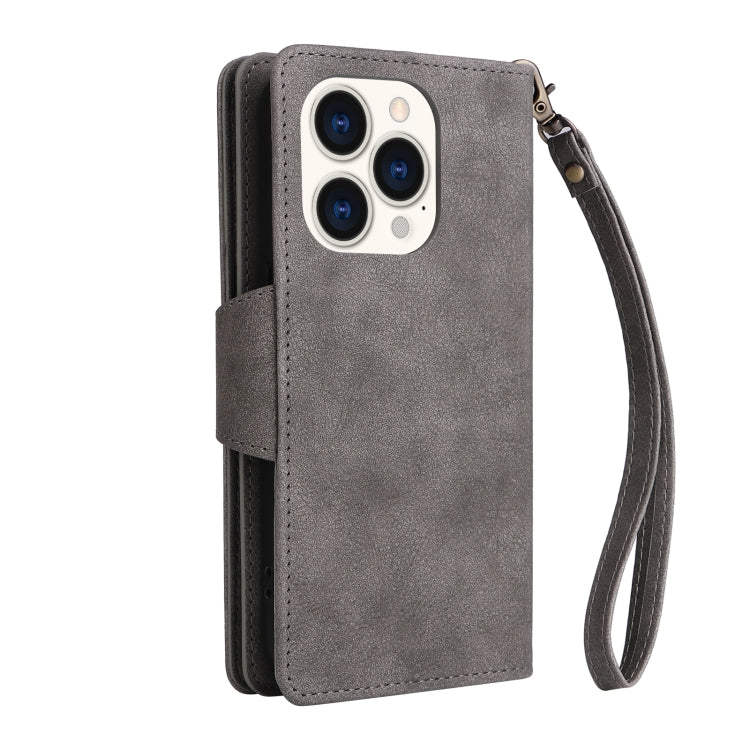 For iPhone 14 Pro Rivet Buckle 9 Cards Three Fold Leather Phone Case