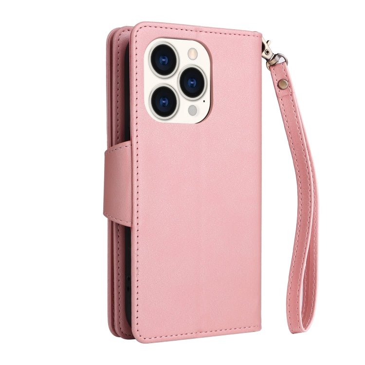 For iPhone 14 Pro Rivet Buckle 9 Cards Three Fold Leather Phone Case