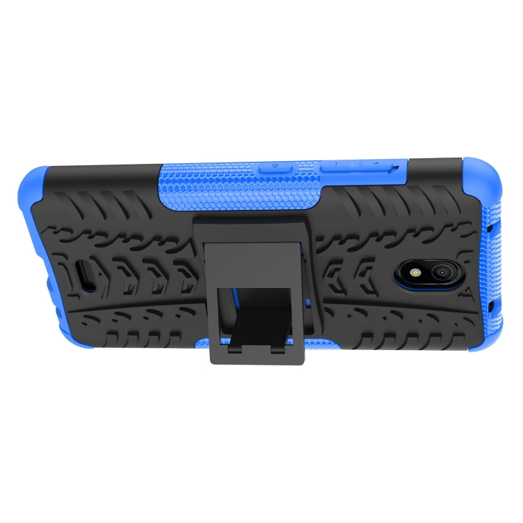 For Nokia C100 Tire Texture TPU + PC Phone Case with Holder