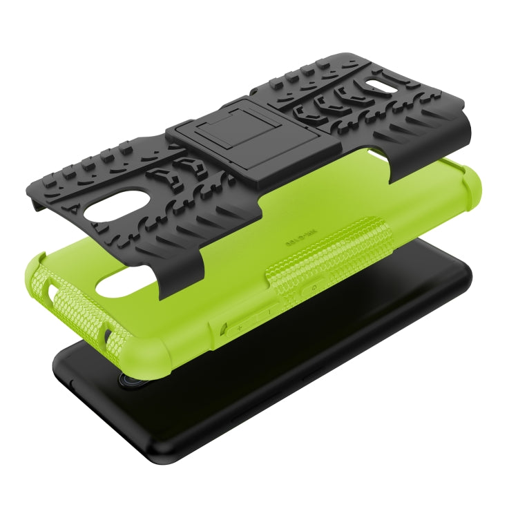 For Nokia C100 Tire Texture TPU + PC Phone Case with Holder
