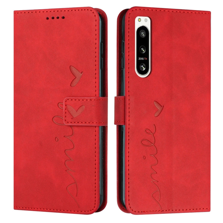 For Sony Xperia 5 IV Skin Feel Heart Embossed Leather Phone Case with Lanyard