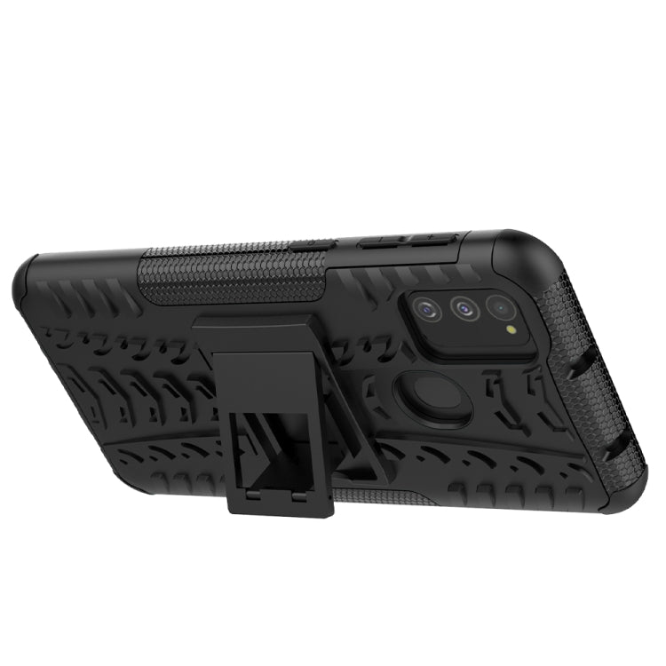 For Galaxy M30s Tire Texture Shockproof TPU+PC Protective Case with Holder