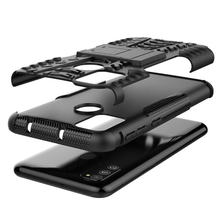 For Galaxy M30s Tire Texture Shockproof TPU+PC Protective Case with Holder