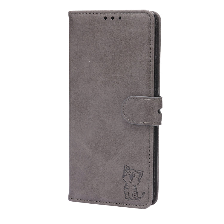 For Google Pixel 7a Embossed Happy Cat Pattern Flip Leather Phone Case