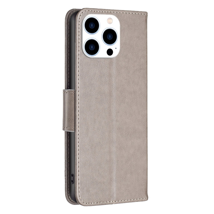 For iPhone 16 Pro Embossing Two Butterflies Pattern Leather Phone Case