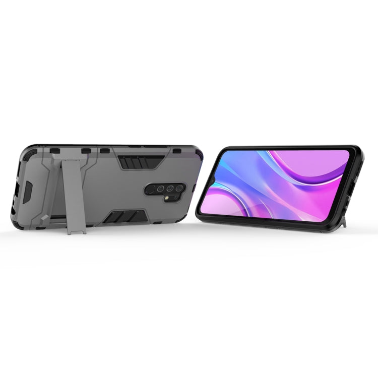 For Xiaomi Redmi 9 PC + TPU Shockproof Protective Case with Invisible Holder