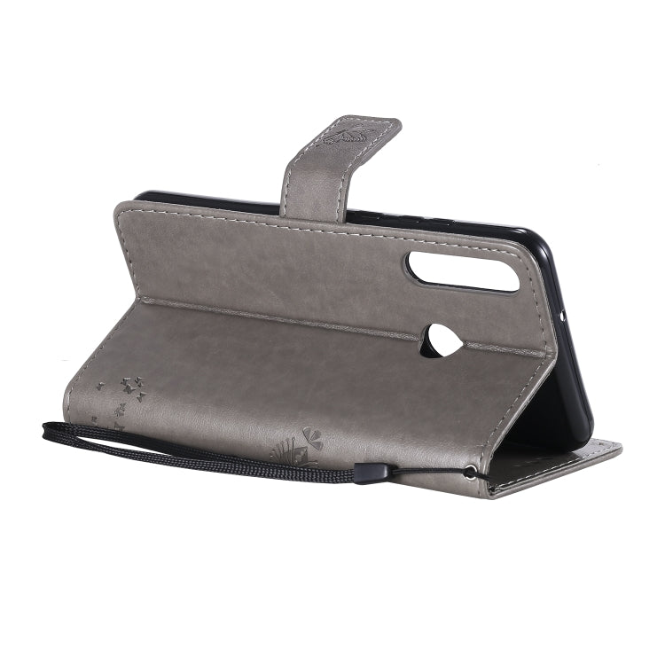 For Huawei Y6p Tree & Cat Embossed Pattern Horizontal Flip Leather Case with Holder & Card Slots & Wallet & Lanyard