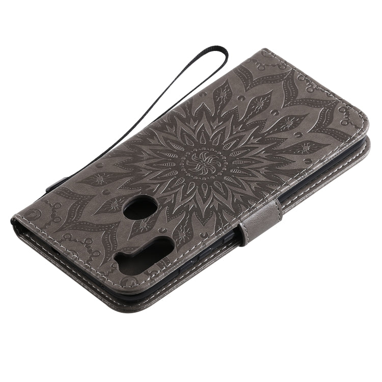 For Samsung Galaxy A11 Embossed Sunflower Pattern Horizontal Flip PU Leather Case with Holder & Card Slots & Wallet & Lanyard