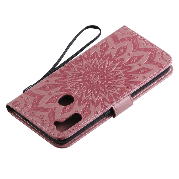For Samsung Galaxy A11 Embossed Sunflower Pattern Horizontal Flip PU Leather Case with Holder & Card Slots & Wallet & Lanyard