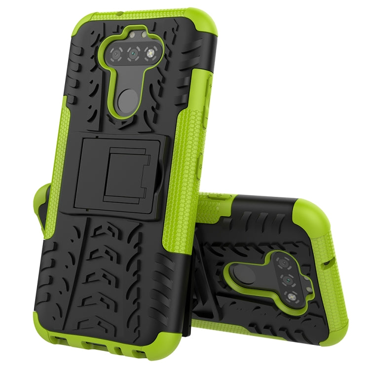 For LG K31 Tire Texture Shockproof TPU+PC Protective Case with Holder