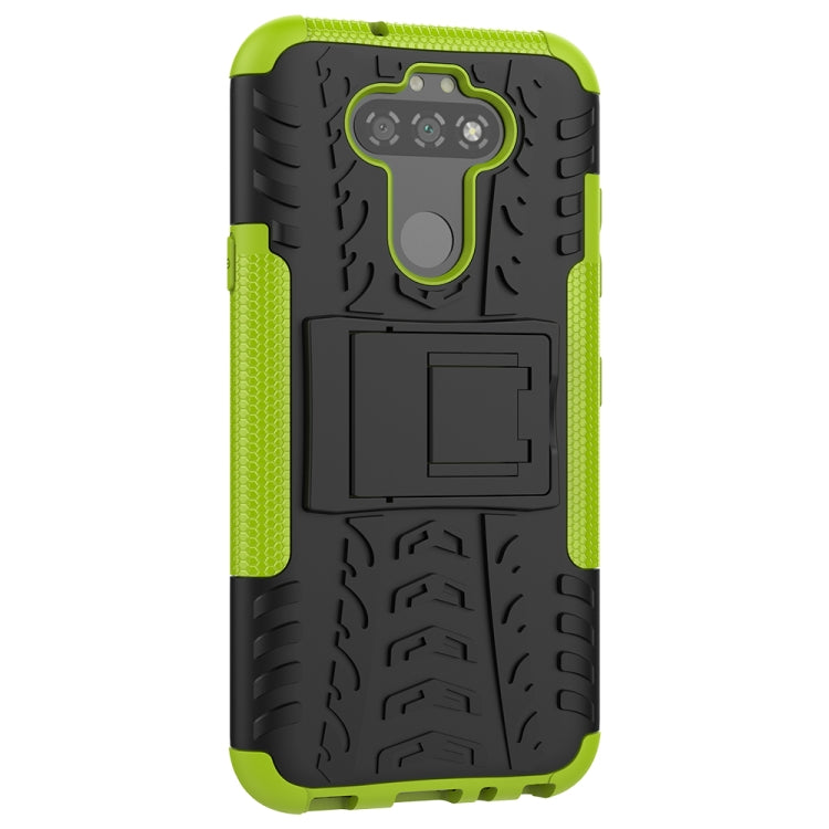 For LG K31 Tire Texture Shockproof TPU+PC Protective Case with Holder