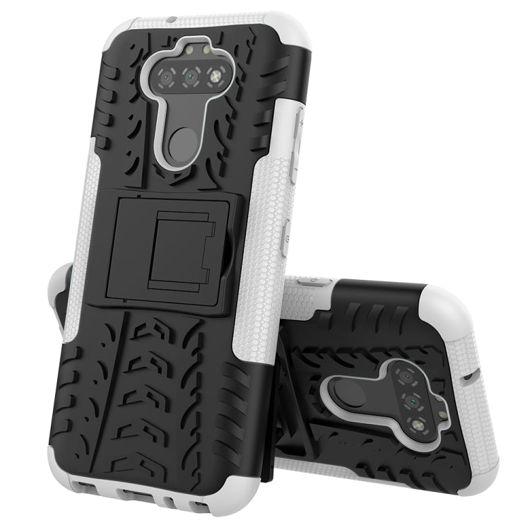 For LG K31 Tire Texture Shockproof TPU+PC Protective Case with Holder