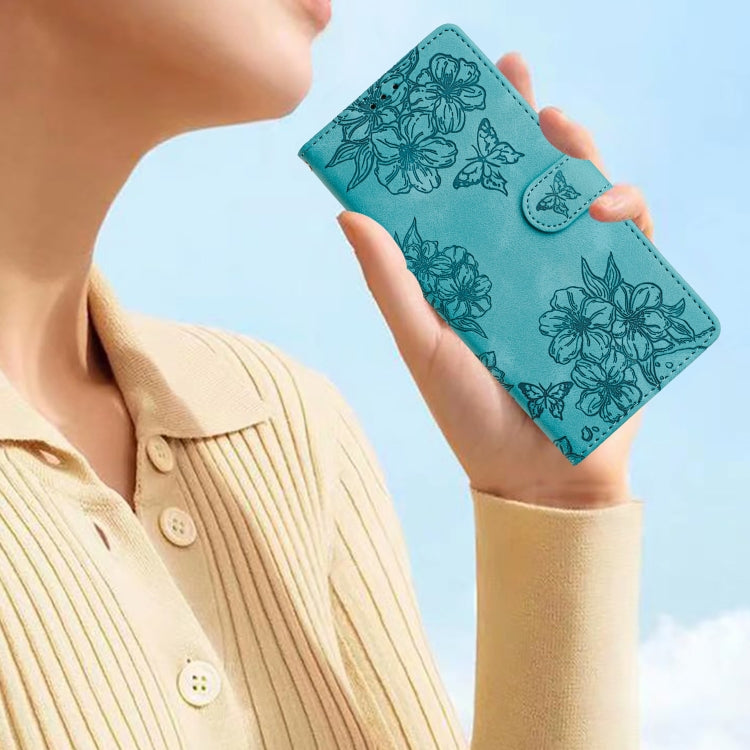 For iPhone 15 Plus Cherry Blossom Butterfly Skin Feel Embossed PU Phone Case
