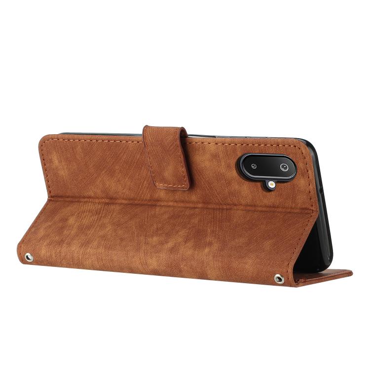 For Samsung Galaxy F06 5G / M06 5G Skin Feel Stripe Pattern Leather Phone Case with Long Lanyard