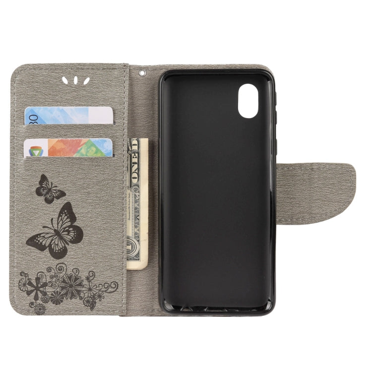 For Samsung Galaxy A01 Core Butterflies Embossing Horizontal Flip Leather Case with Holder & Card Slots & Wallet