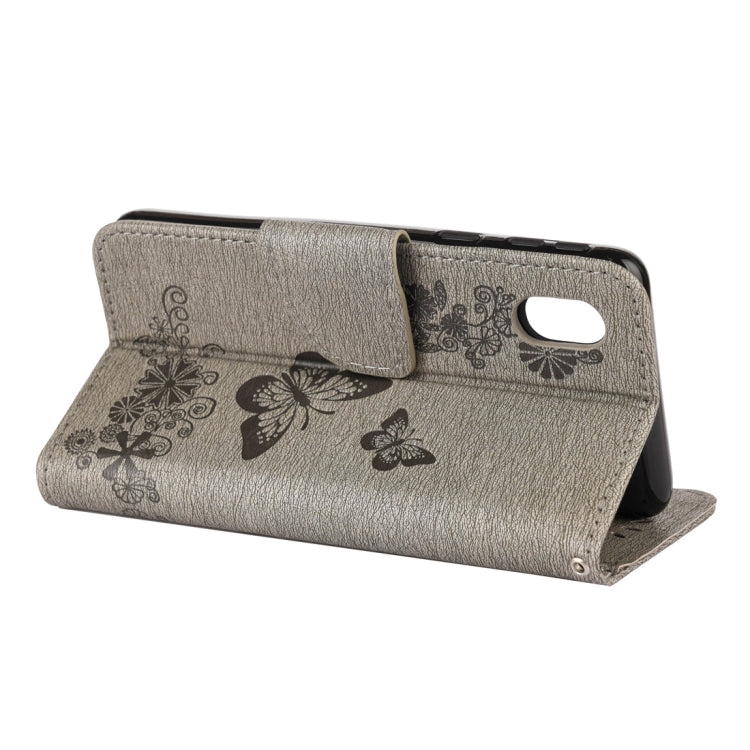 For Samsung Galaxy A01 Core Butterflies Embossing Horizontal Flip Leather Case with Holder & Card Slots & Wallet