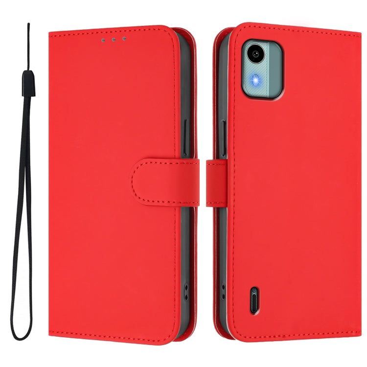 For Nokia C12 Skin Feel Solid Color Leather Phone Case with Lanyard