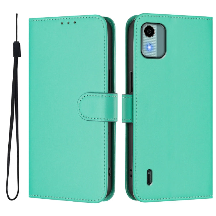For Nokia C12 Skin Feel Solid Color Leather Phone Case with Lanyard