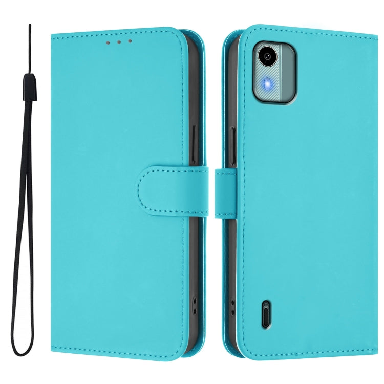 For Nokia C12 Skin Feel Solid Color Leather Phone Case with Lanyard