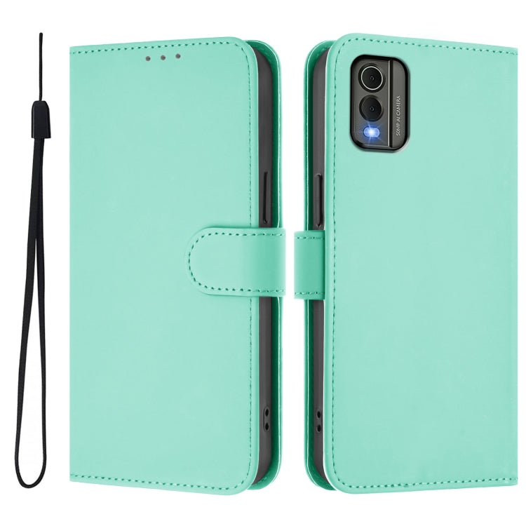 For Nokia C32 Skin Feel Solid Color Leather Phone Case with Lanyard